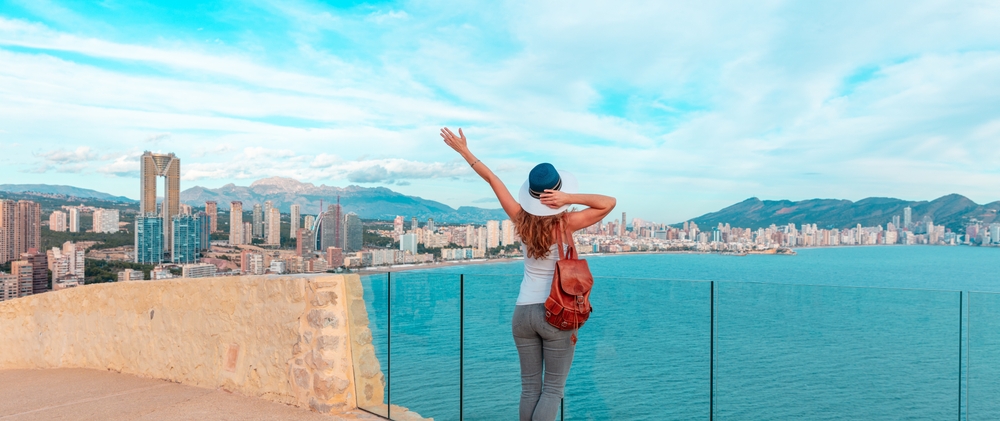 Woman,Tourist,Enjoying,Panoramic,View,Of,Benidorm,,Alicante,Province,In