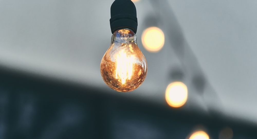 Outdoor,Lighting,Fixture,Featuring,A,Classic,Bulb,Hanging,From,A