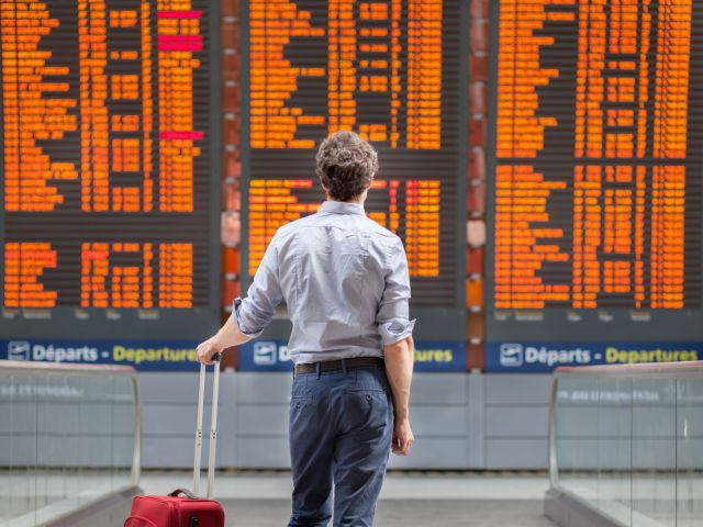 Travel,With,International,Flight,,Person,Passenger,Waiting,In,Airport,Departure