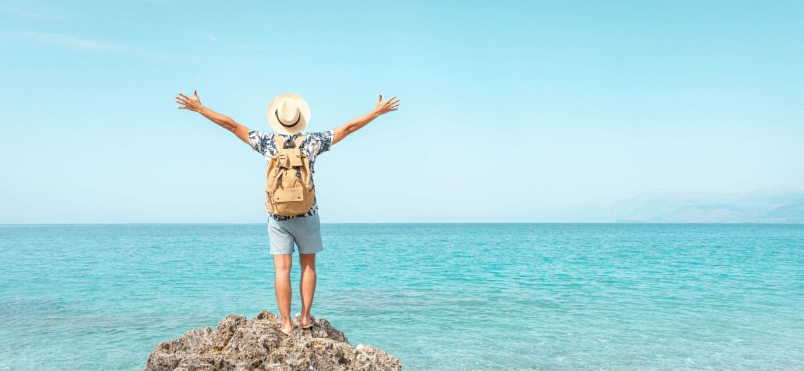 Happy,Tourist,Enjoying,Summer,Vacation,-,Delightful,Man,With,Hands