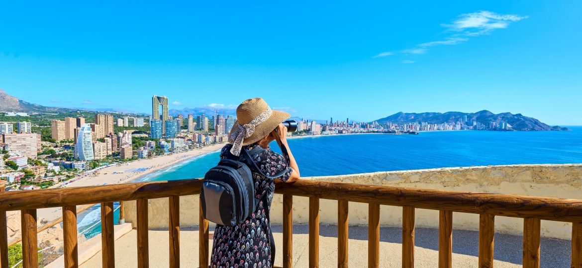 Tourist,Woman,Photographing,The,City,Of,Benidorm,,Alicante,,Valencian,Community,
