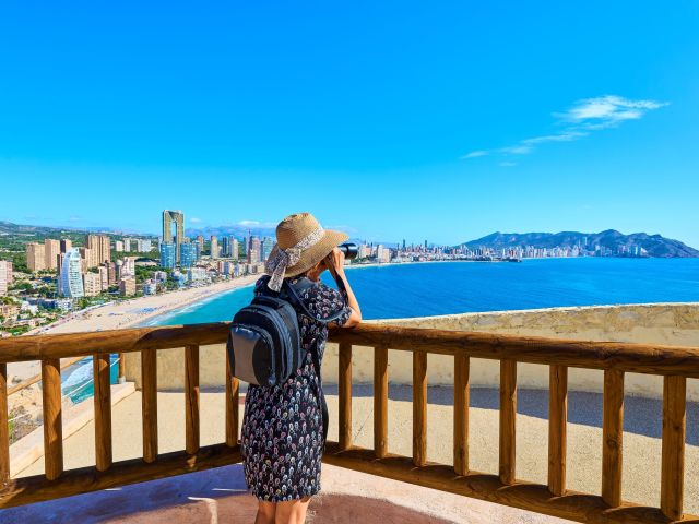 Tourist,Woman,Photographing,The,City,Of,Benidorm,,Alicante,,Valencian,Community,